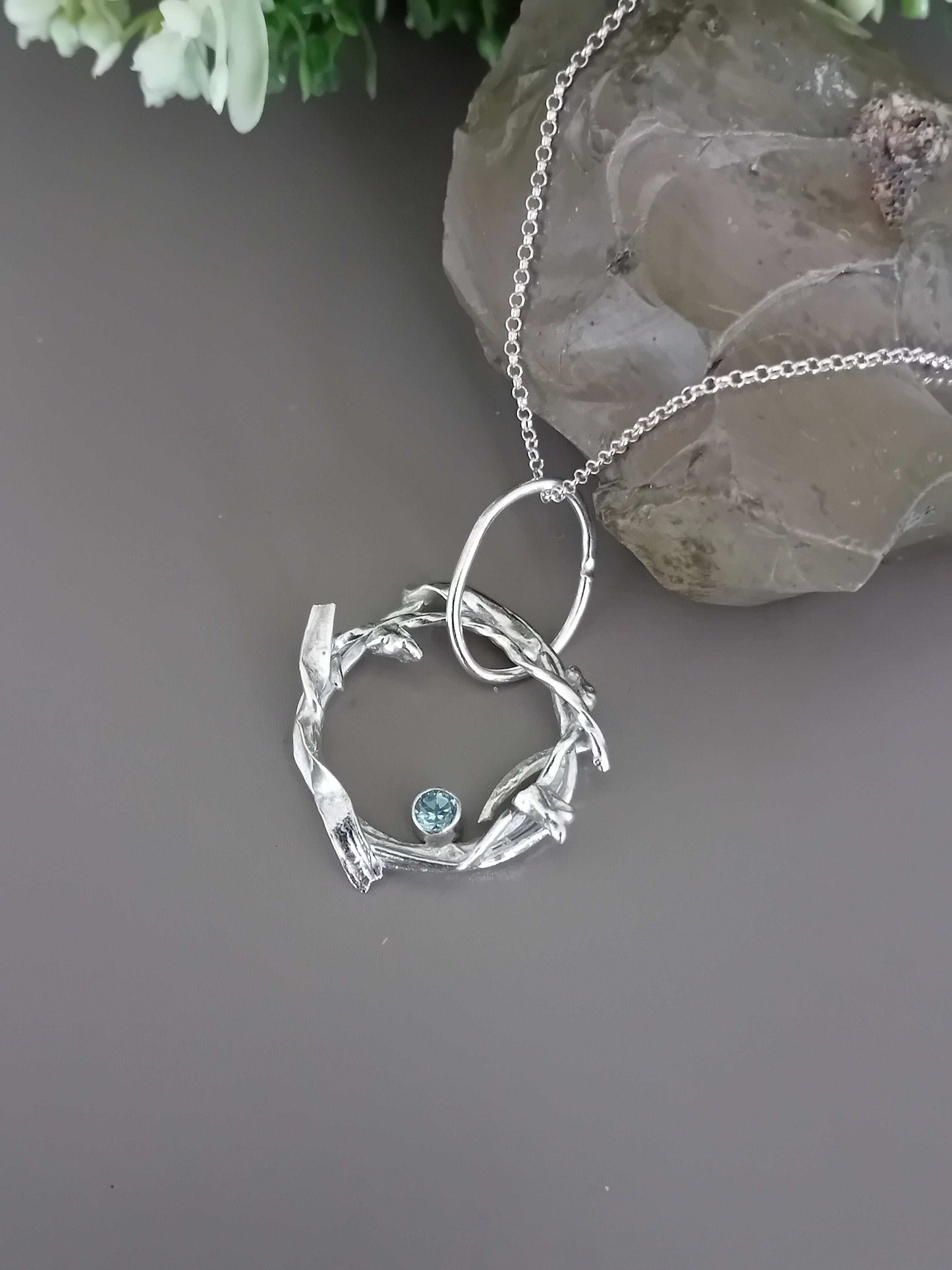 The Stork Nest Pendant - sterling silver with sky blue topaz