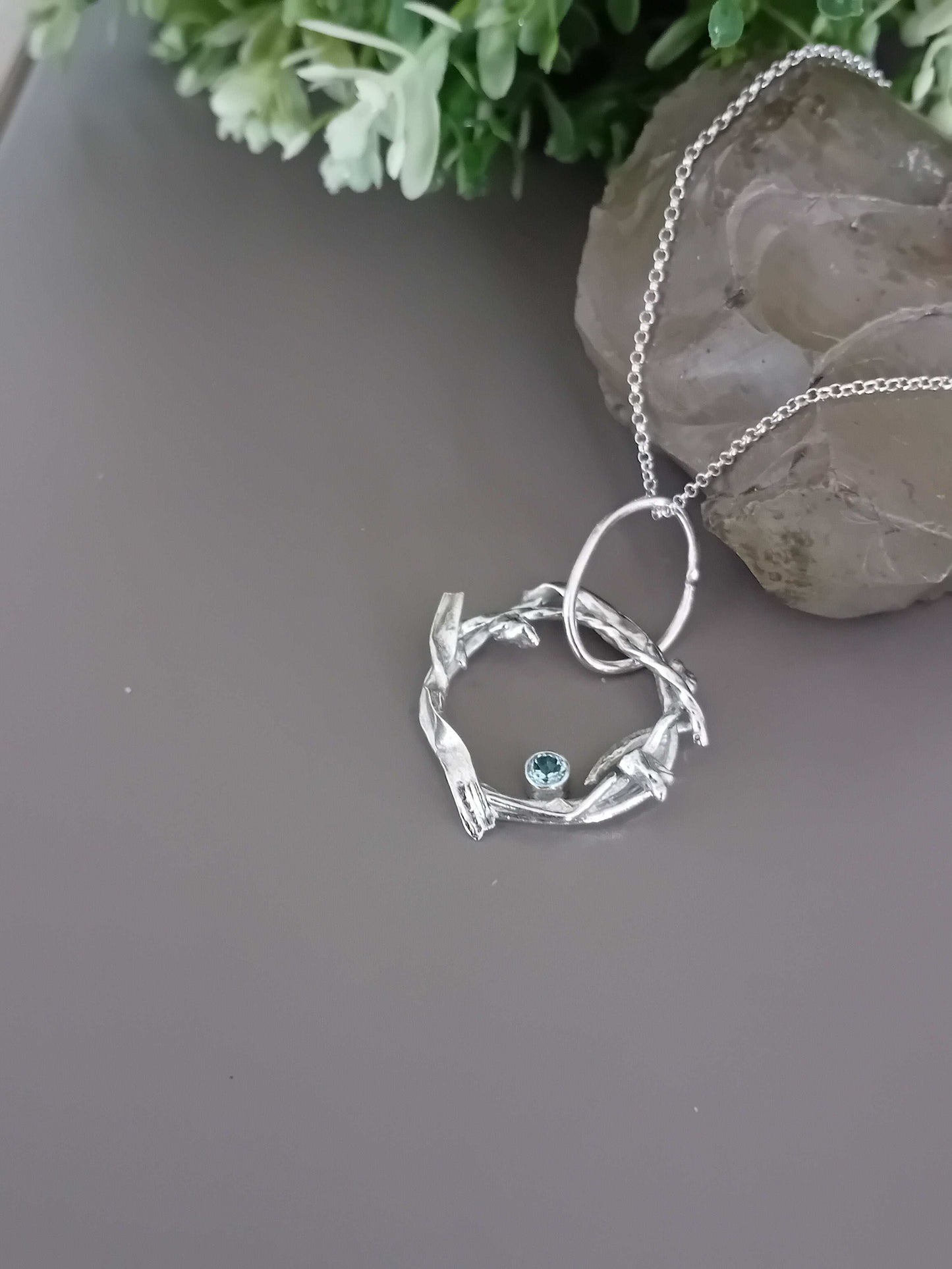 The Stork Nest Pendant - sterling silver with sky blue topaz