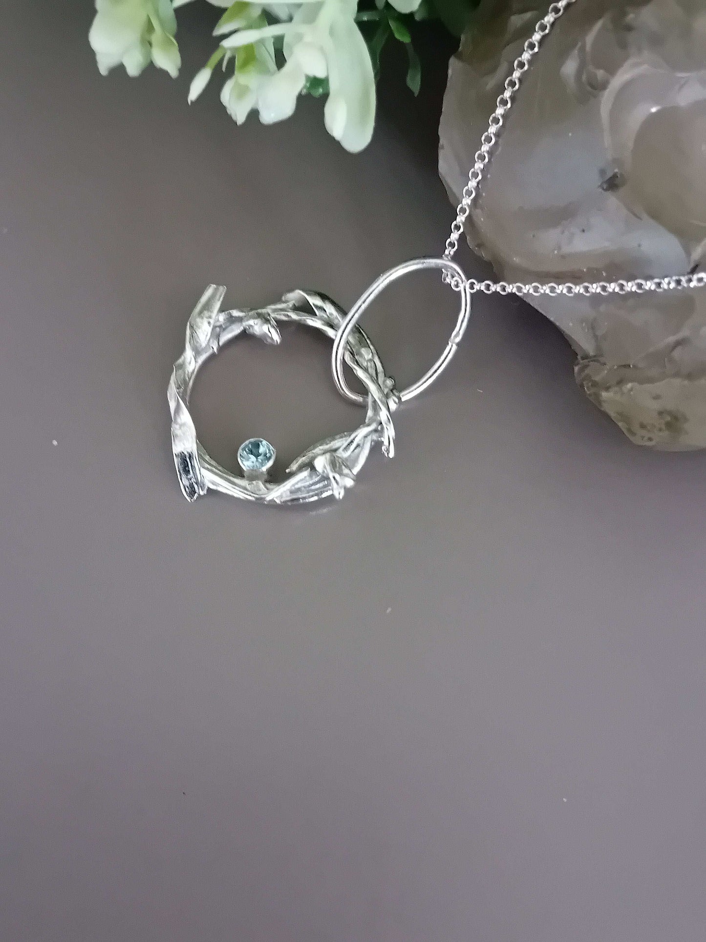 The Stork Nest Pendant - sterling silver with sky blue topaz
