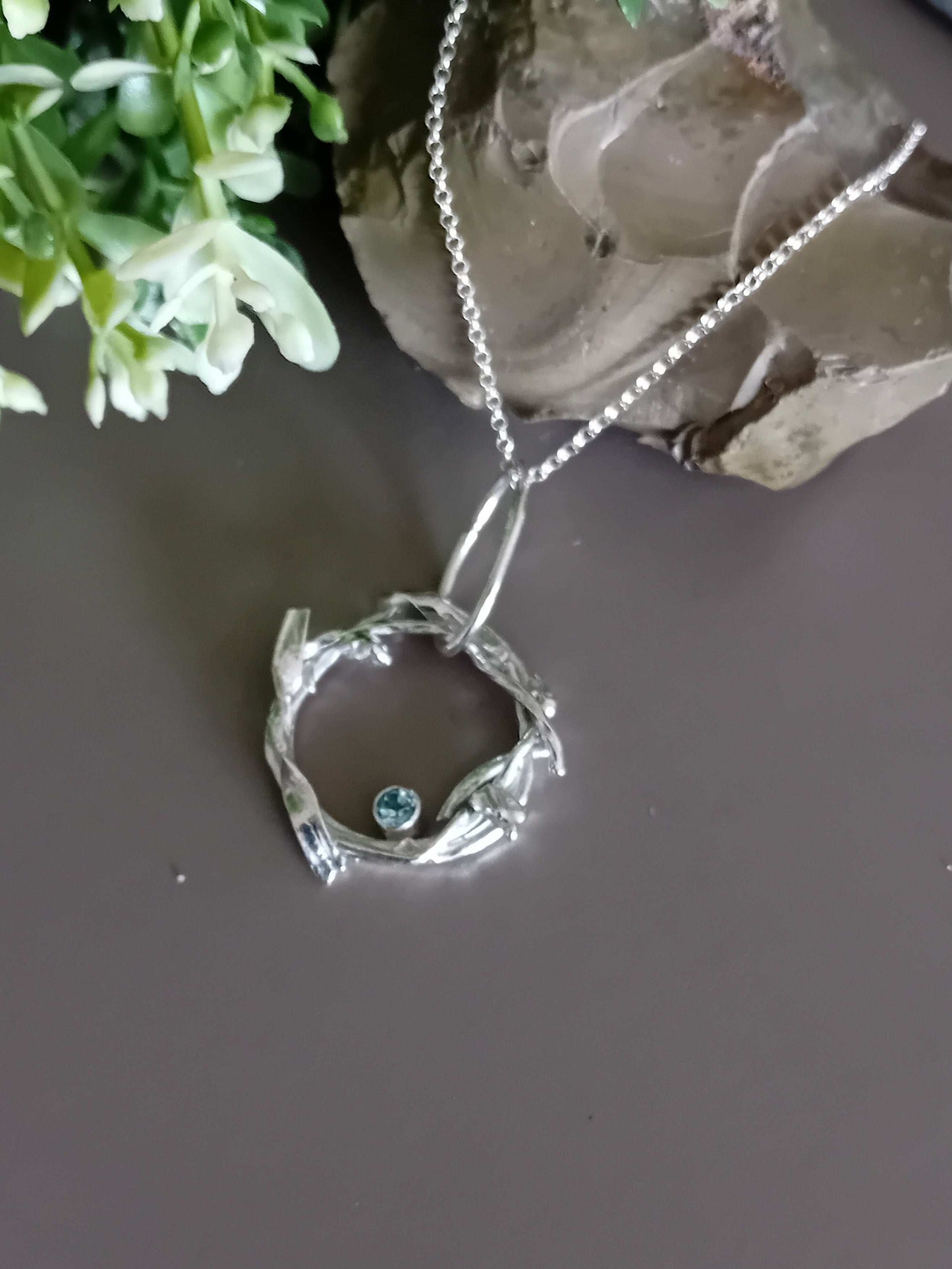 The Stork Nest Pendant - sterling silver with sky blue topaz