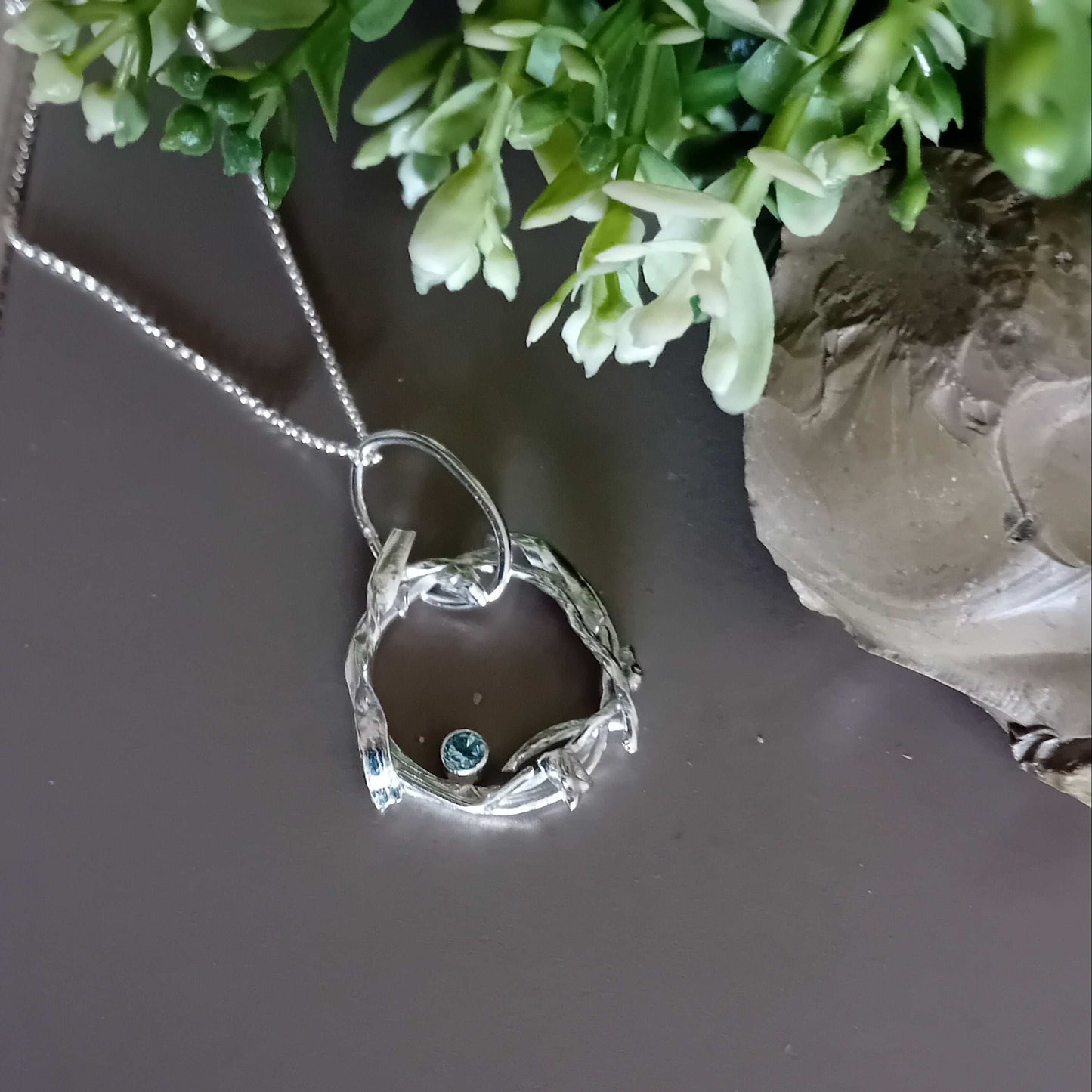 The Stork Nest Pendant - sterling silver with sky blue topaz