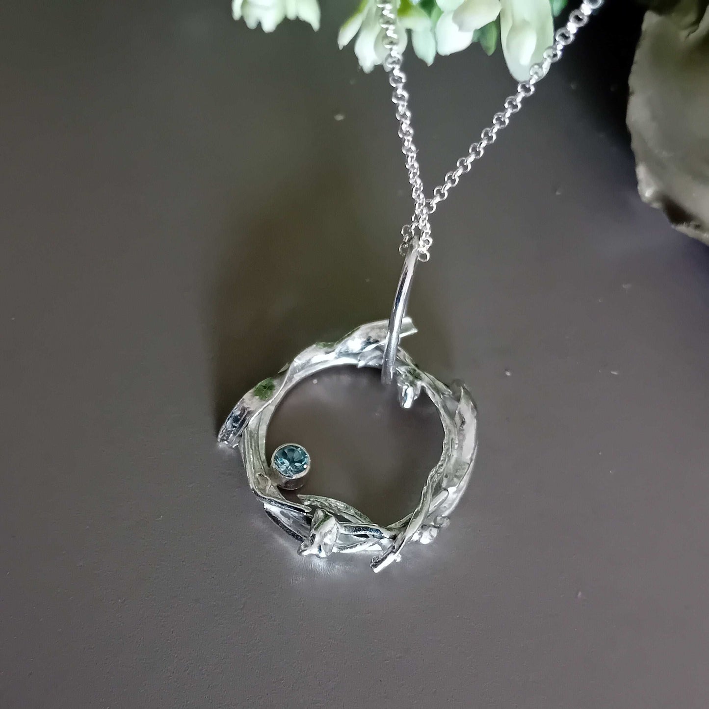 The Stork Nest Pendant - sterling silver with sky blue topaz