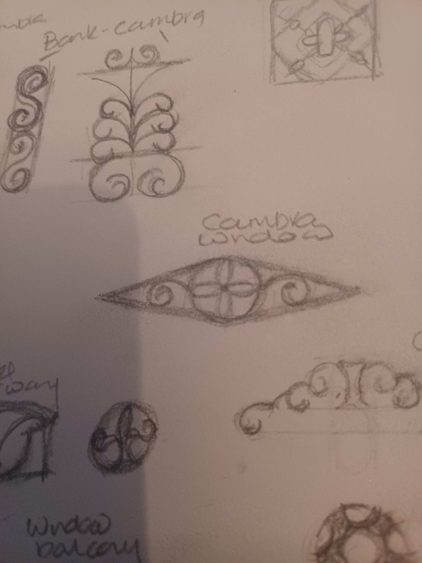 Collection of decorative sketches of balcony designs on paper