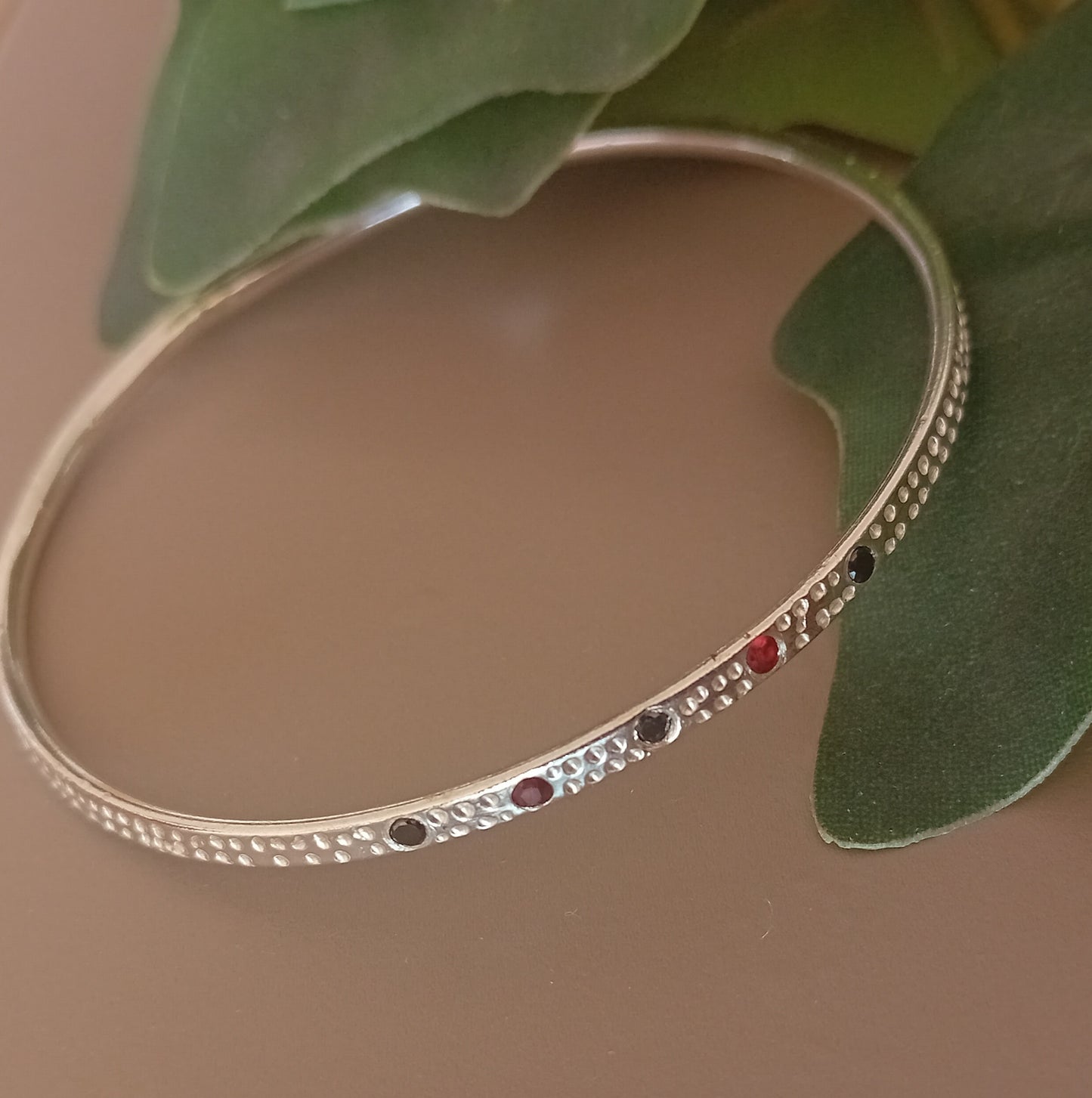 Handmade sterling silver bangle set with cubic zirconia